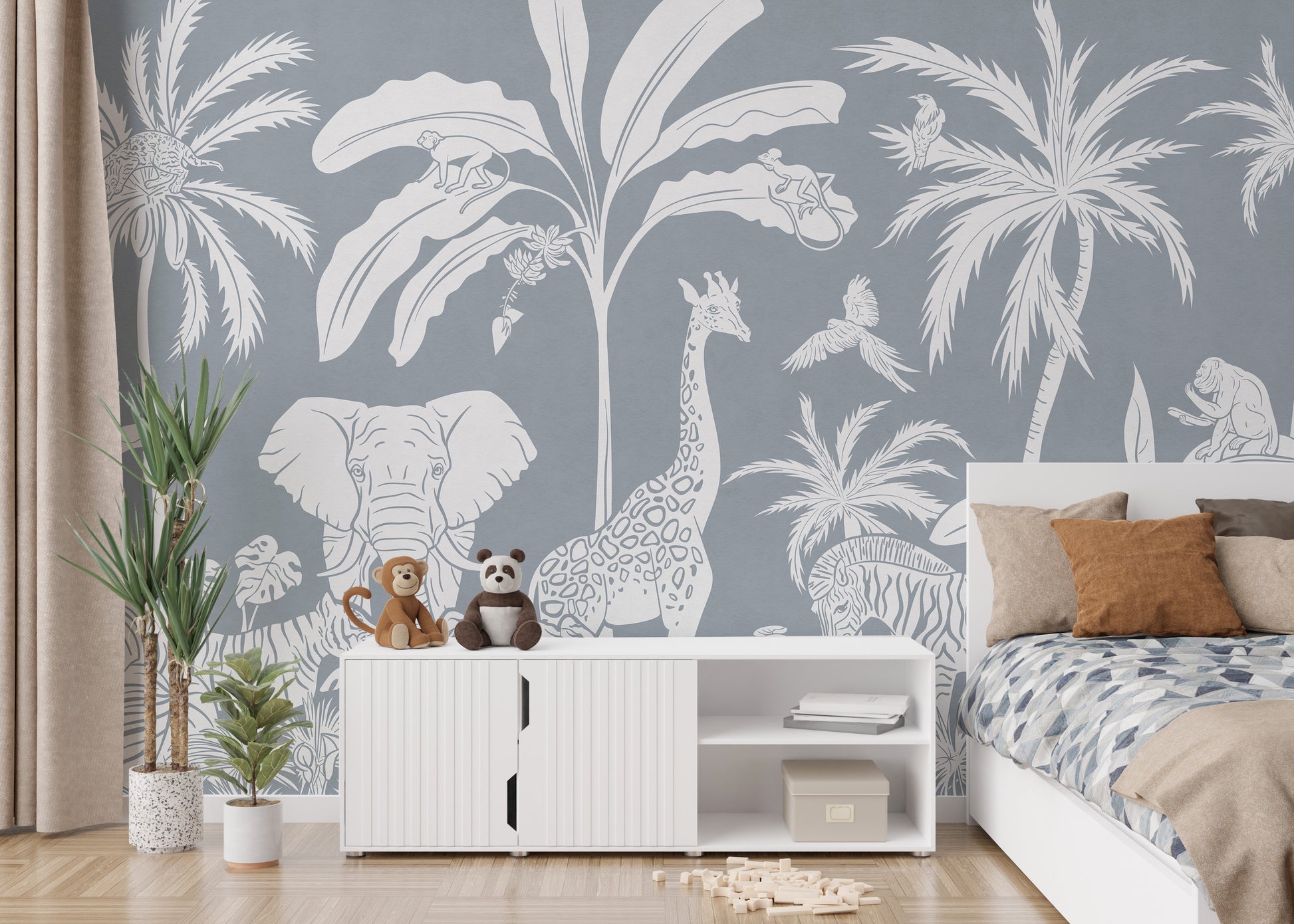 Self adhesive Monochrome Jungle Blue Wall Mural in a living space with a white console cabinet and green plants.