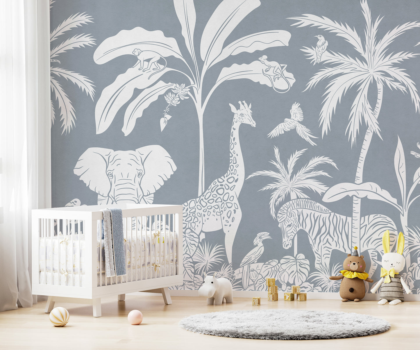 Premium canvas Monochrome Jungle Blue Wall Mural in a serene nursery room featuring a clean white crib.
