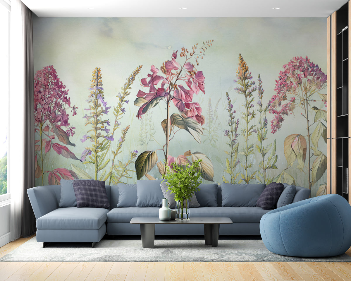 Wild Flowers Meadows Blue wallpaper mural of pink florals on soft green behind a blue sectional sofa in a living room