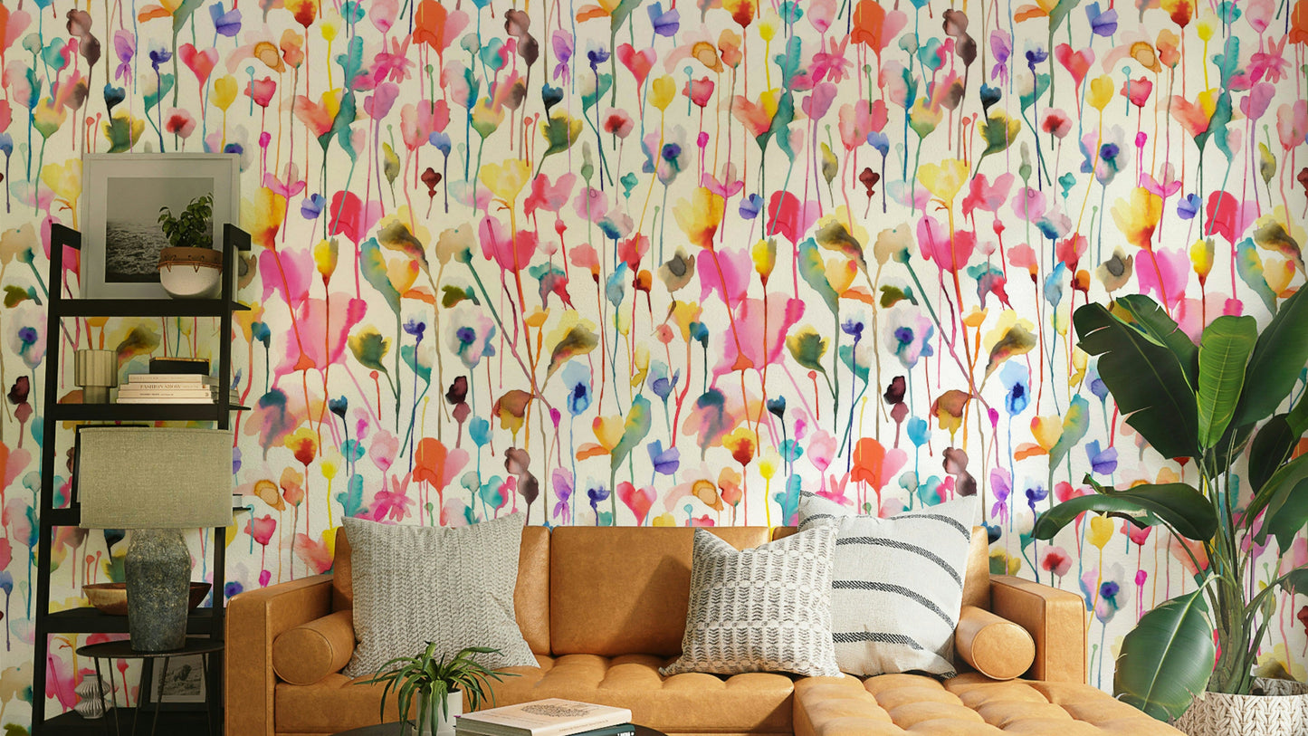 Wild Flowers Watercolor Pink Wallpaper in a modern flat lounge with velvet furniture.