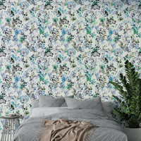 Soft blue botanical colour palette wallpaper for a master bedroom feature wall.