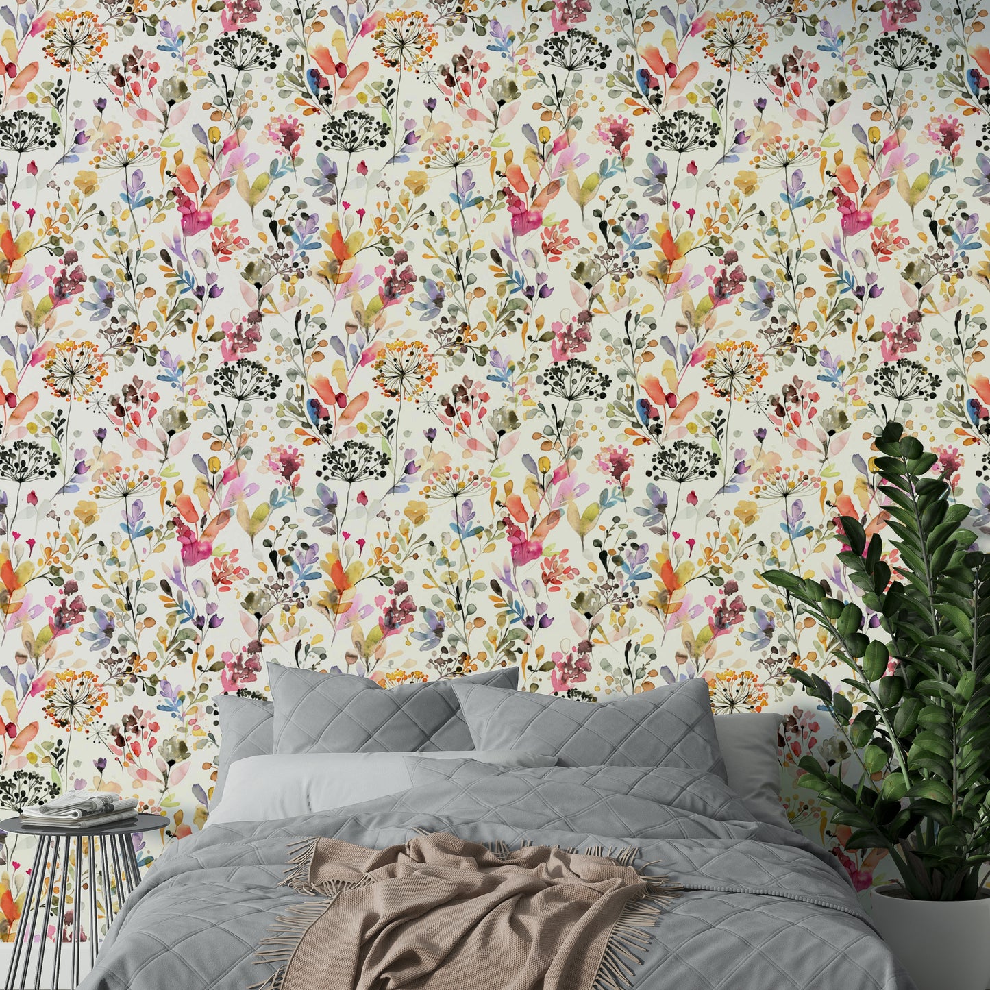 Gentle meadow landscape wallpaper for a study with a minimalist desk setup.