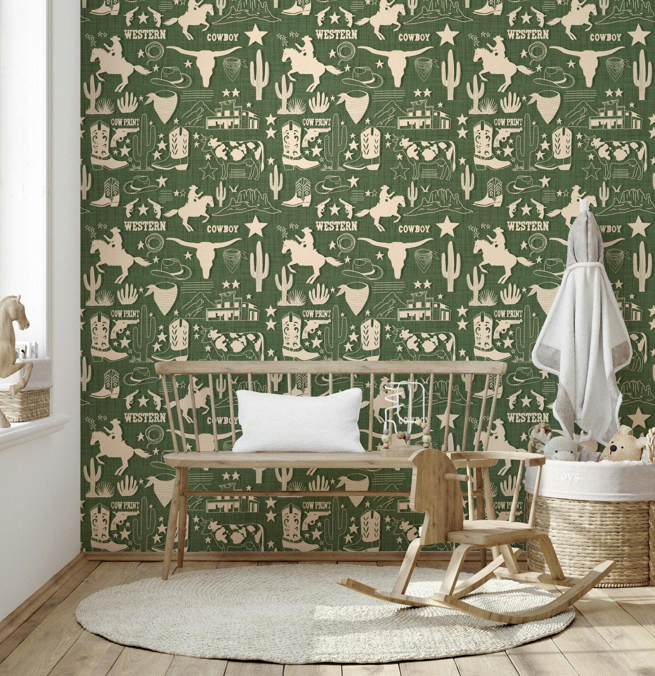 Wild West Sketch wallpaper featuring hand-drawn cowboy motifs, longhorns, and cacti on a textured green background.