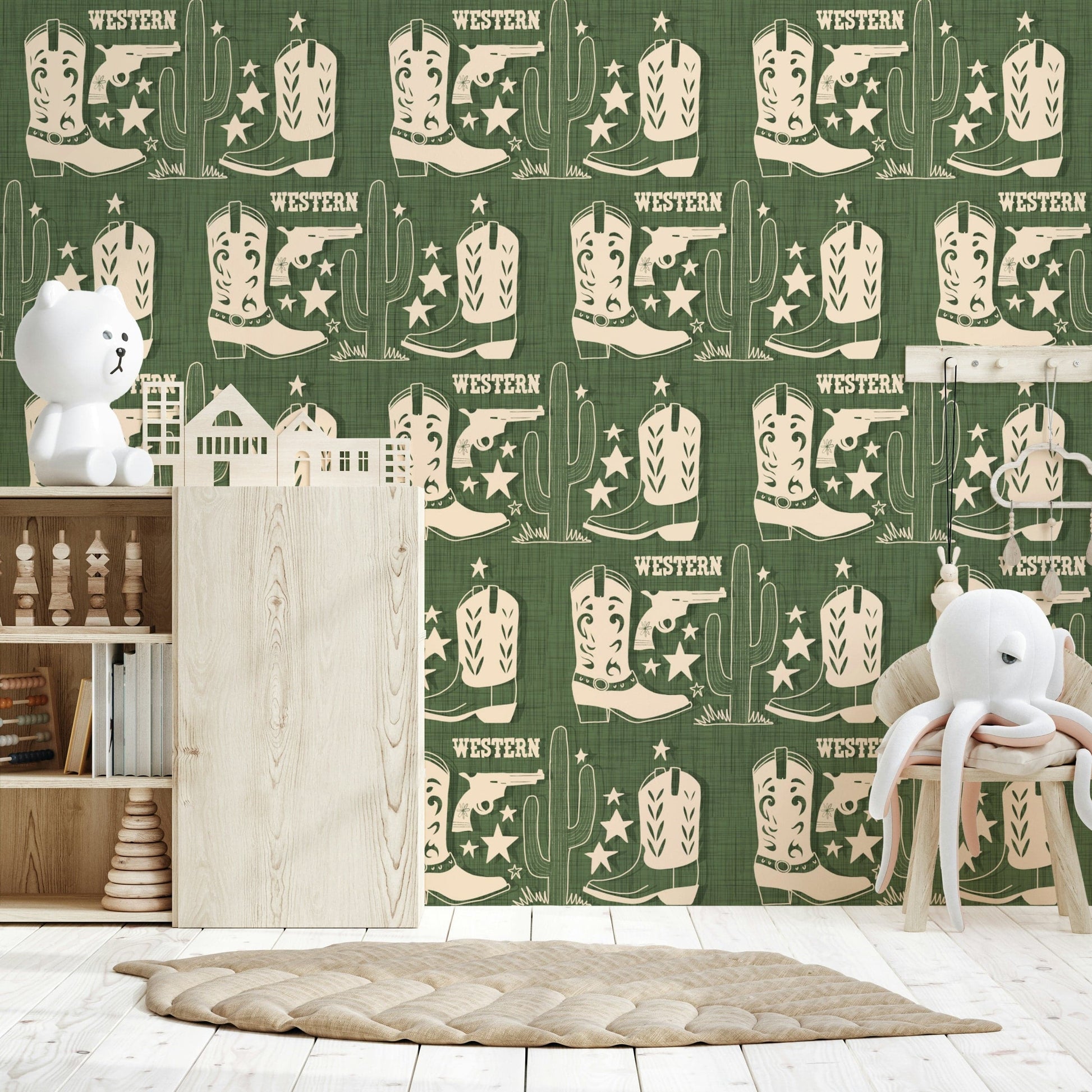 Wild West Charm wallpaper featuring stencil-style frontier icons on a woven-look green texture.