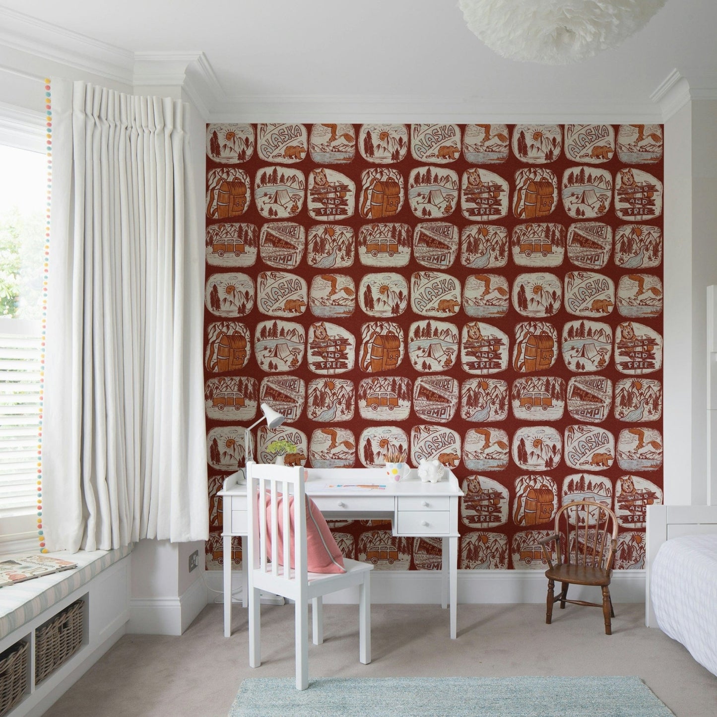 Rustic wallpaper mural showcasing hand-drawn wilderness patches in warm brown and cream tones.