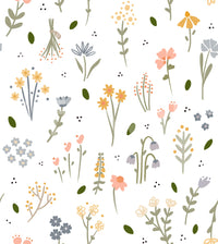 Wildflowers wallpaper close-up showing delicate pastel blooms in peach, blue and mustard scattered on white