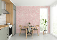 The colors are rich and warm, with a dominant pink and cream tone.

