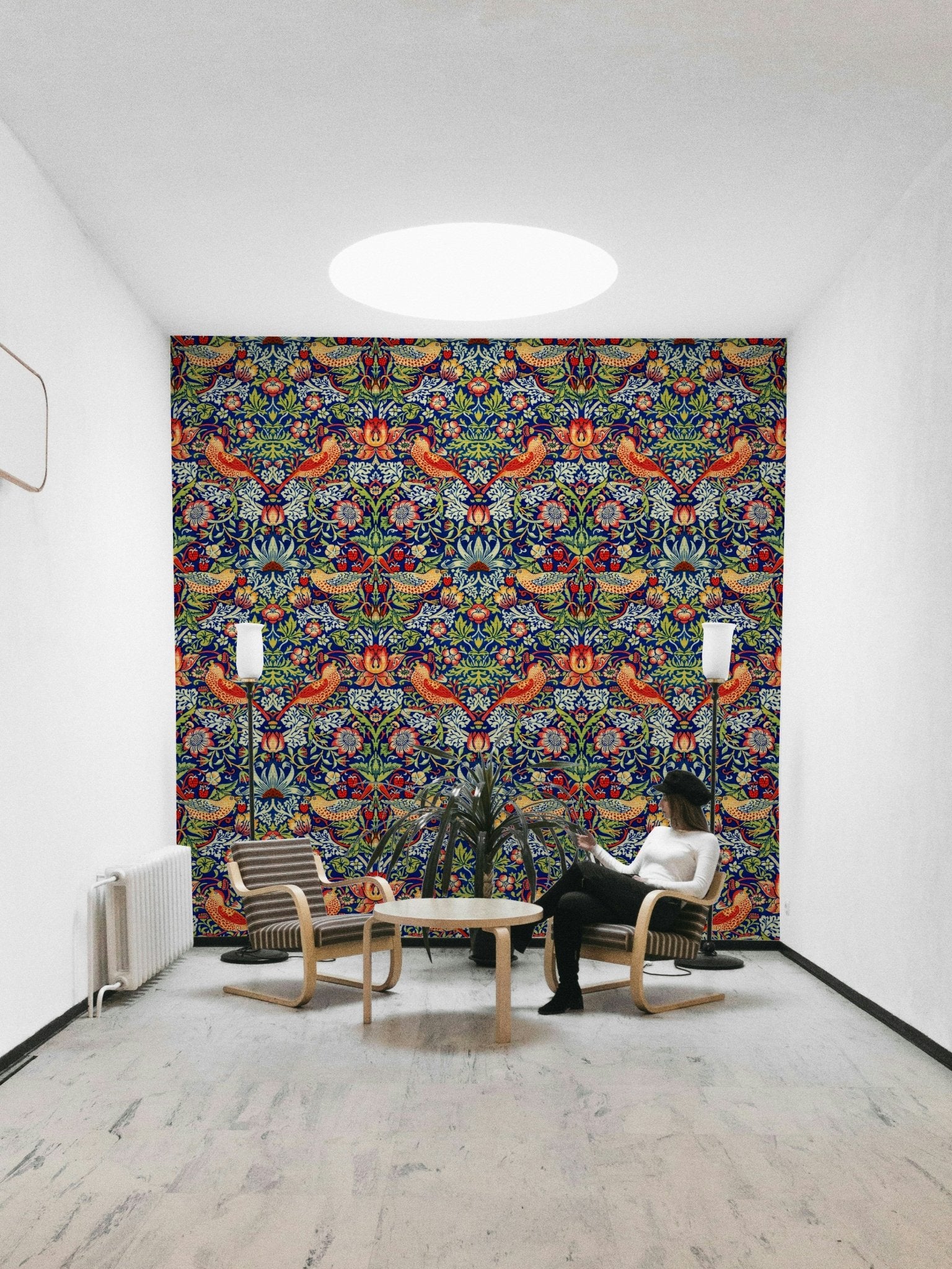 The wallpaper is installed in a classic, elegant living room.

