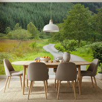 Nature wallpaper featuring a curving pathway and lush green woodland. Serenity design.