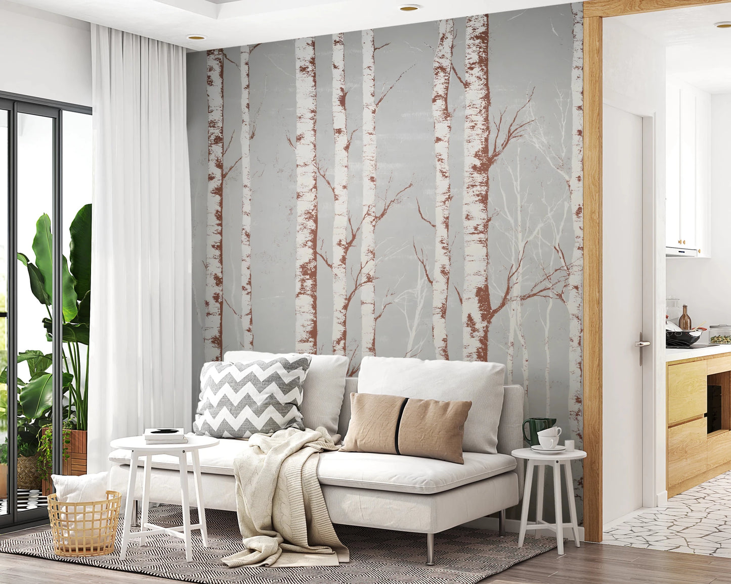 Winter Birch Beauty wallpaper mural with white birch trunks on grey behind a white daybed with grey and tan pillows in a living room