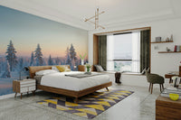 Trees are covered in a thick layer of white snow.
