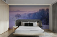 Snowy winter landscape mural featuring frosted trees and distant mountains.


