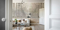 The image shows a path lined with bare trees.

