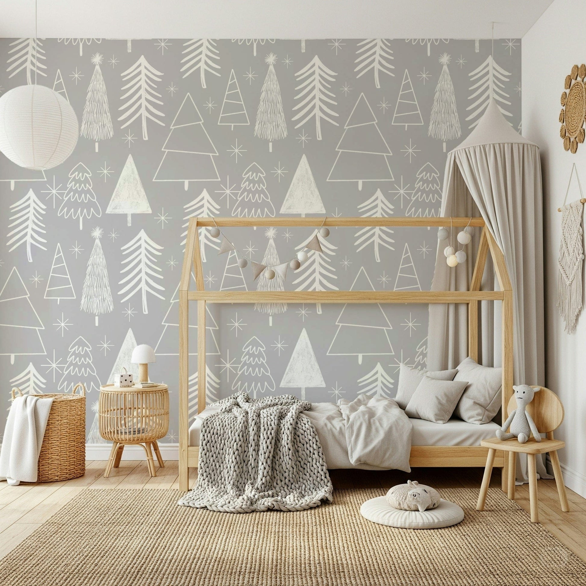 A cozy gray wallpaper decorated with simple white Christmas tree illustrations and tiny stars.