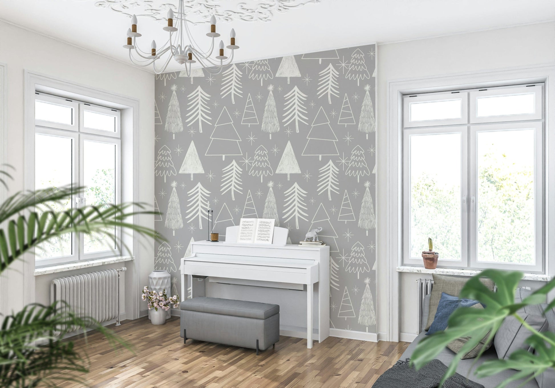 A soft winter wallpaper featuring hand-drawn white evergreen trees on a gentle gray background.