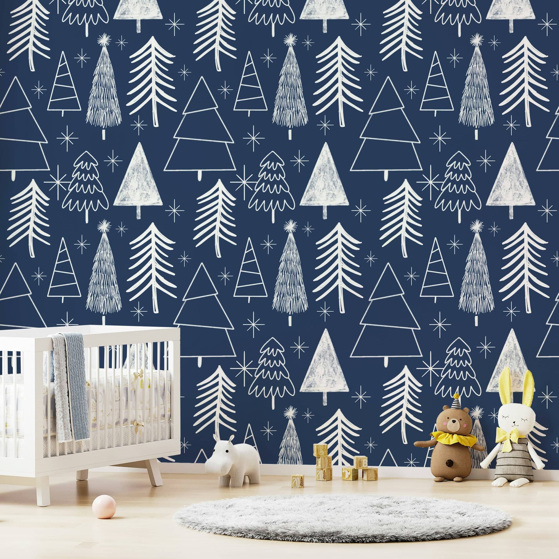 A holiday-themed wallpaper with scattered winter tree outlines in soft white tones.