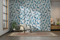 Modern apartment accent wall featuring a chilled blue winter forest scene.