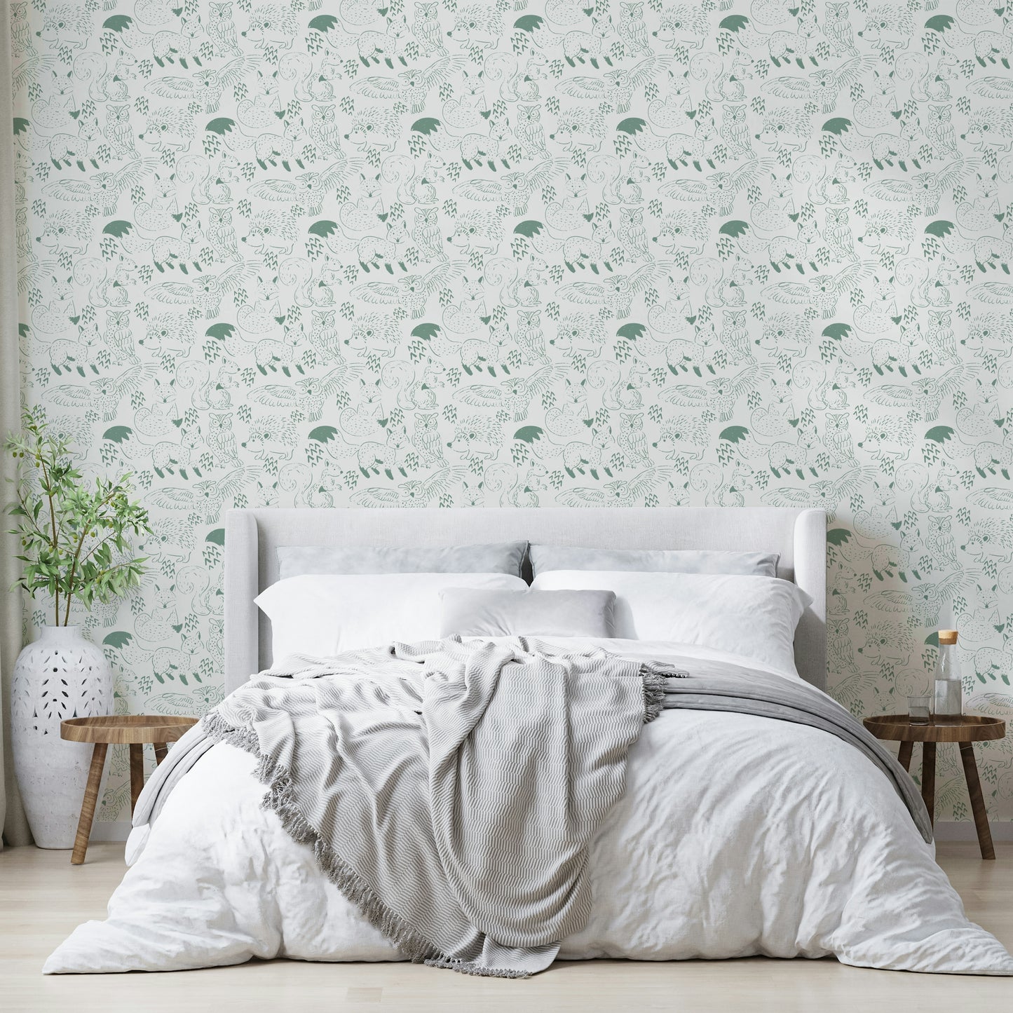 Gentle forest animal wallpaper in calming green

