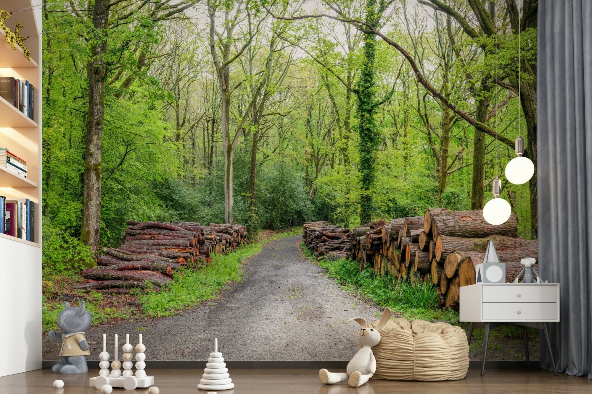 Woodland Harmony wall mural of a forest path with log stacks in a kids room with toys and a white dresser