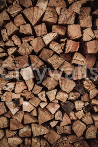 Woodpile Texture wallpaper mural close-up showing tightly stacked split firewood logs in warm brown tones