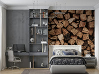 Woodpile Texture wallpaper mural of brown firewood above a bed in a grey bedroom and home office