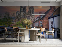 A living room featuring the historic cathedral street mural.