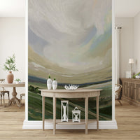Oil painting style wallpaper featuring green rolling hills for a master bedroom.