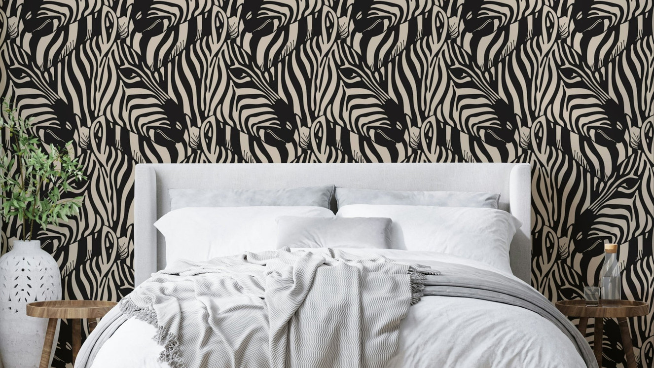 A wallpaper design with a zebra herd.

