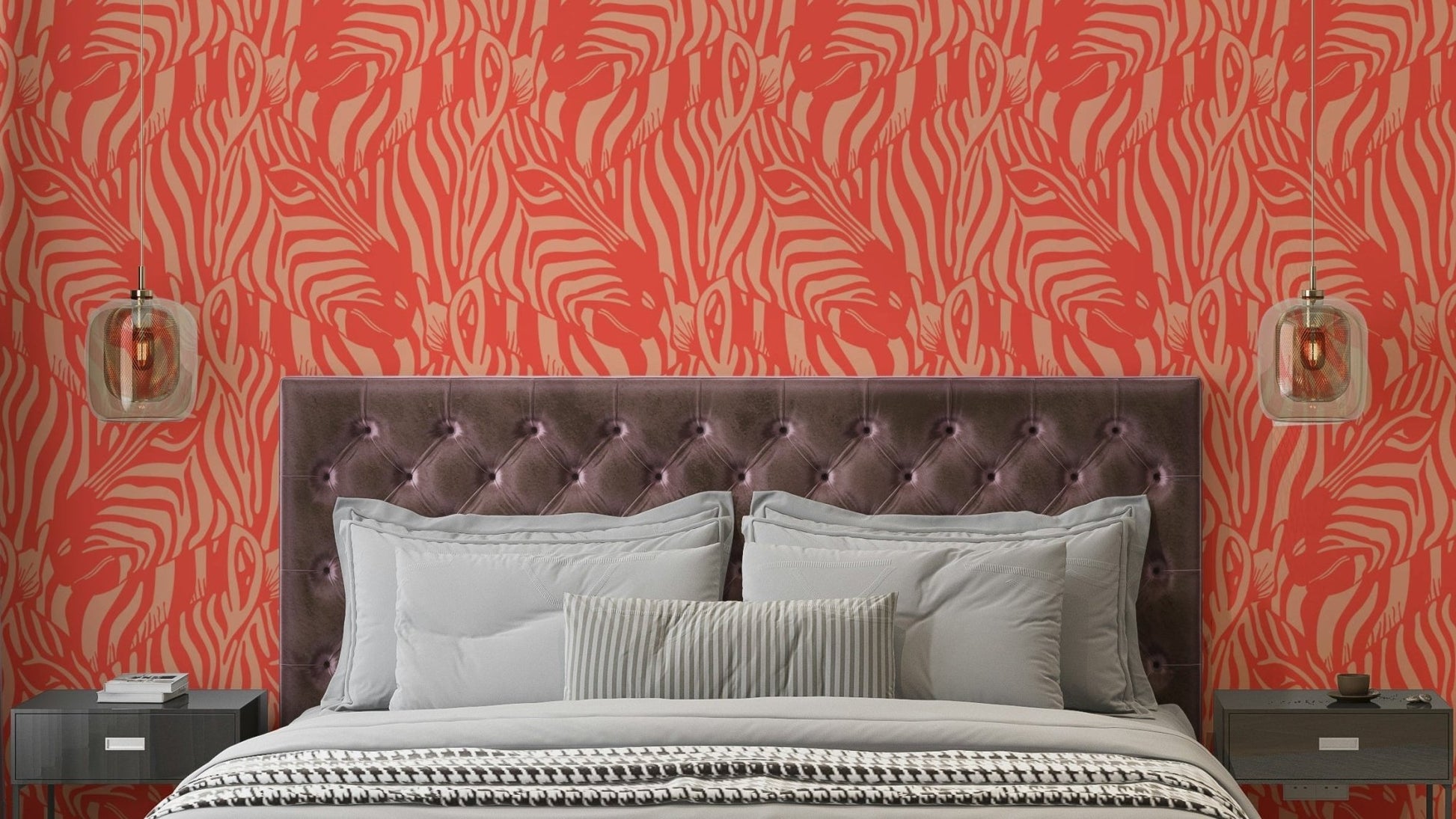 A wall mural of a zebra herd with artistic stripes.

