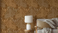 A wall mural of a zebra herd with artistic stripes.


