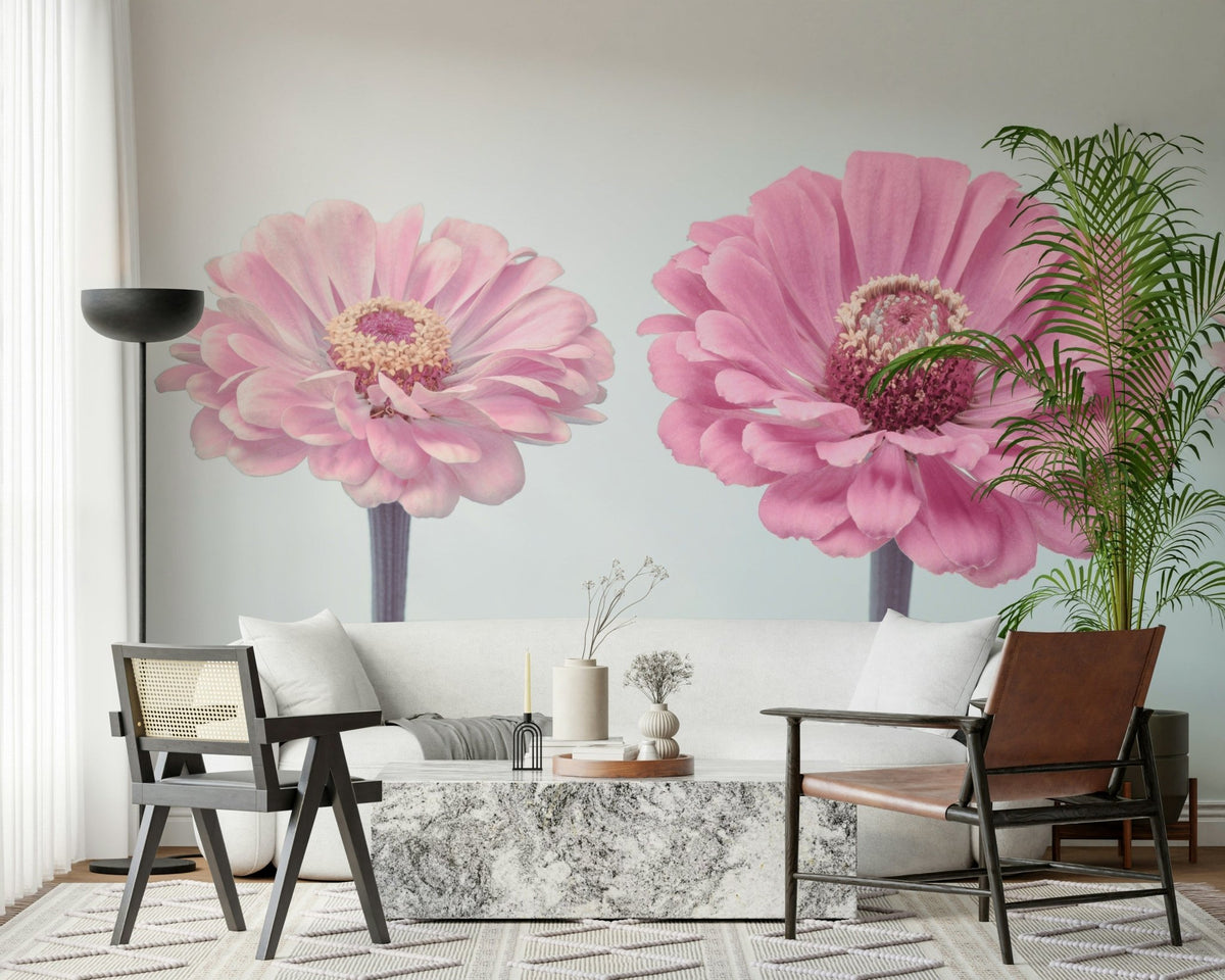 Zinnia Dream wallpaper mural of two large pink zinnia blooms in a living room with a white sofa and leather chair